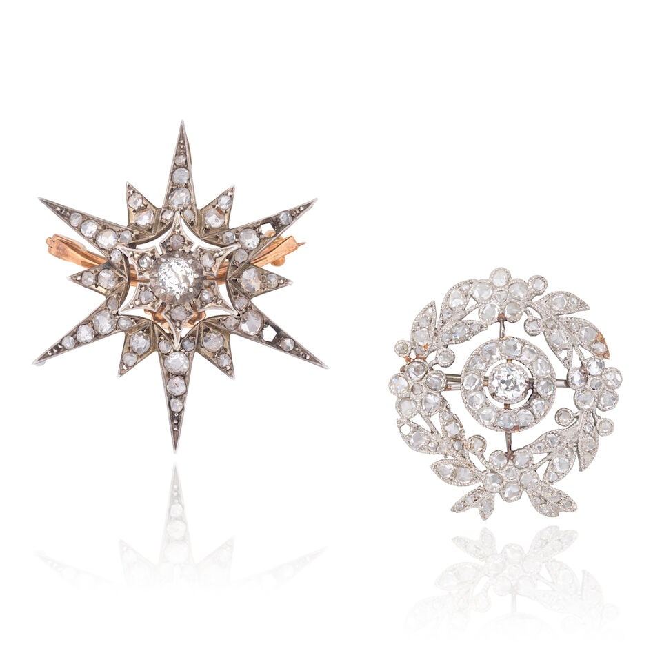 TWO DIAMOND-SET BROOCHES: TWO DIAMOND-SET BROOCHES 1st: Floral brooch Rose-cut diamonds Length 2.7cm Weight approx. 5.0g Cased by Hennell 2nd: Star brooch/pendant, circa 1890 Rose and old brilliant-cut diamonds Mounted in