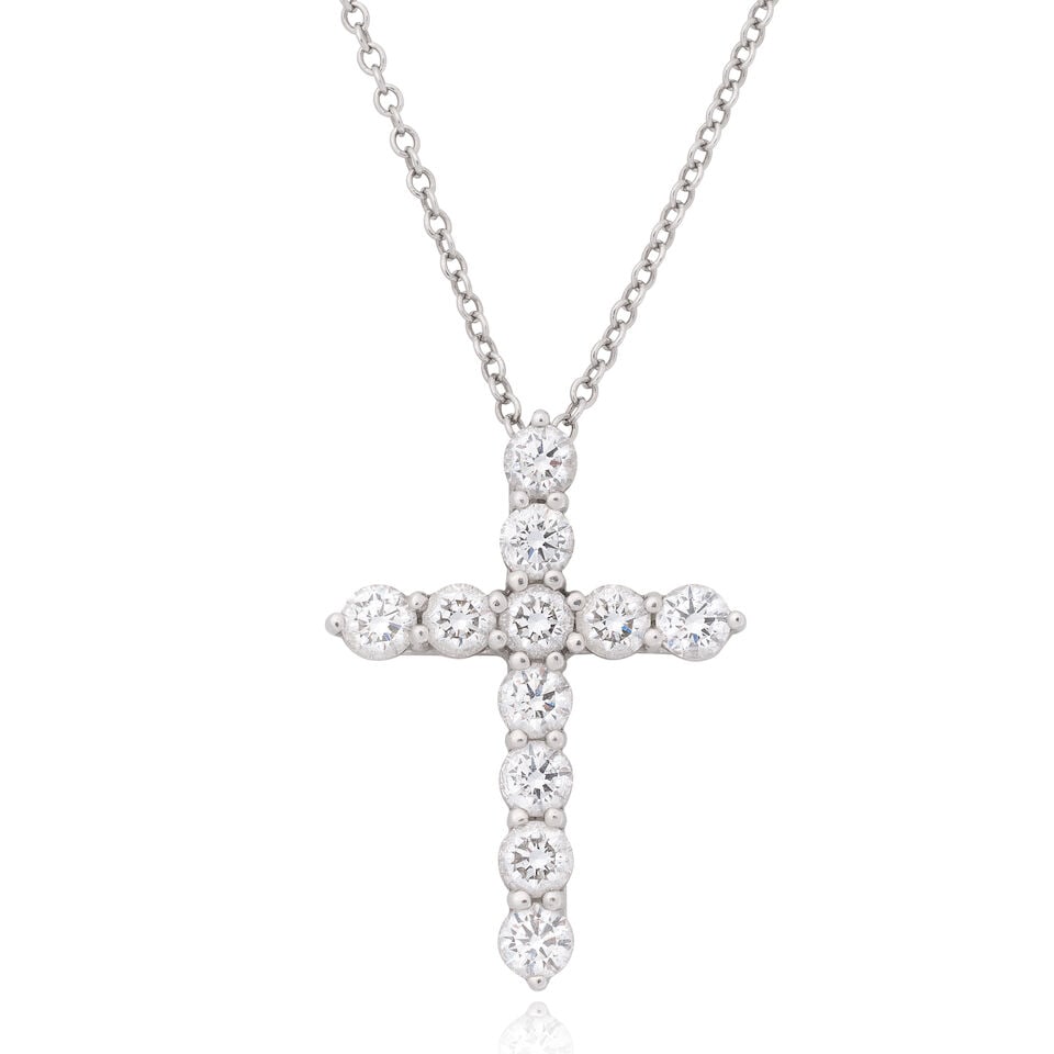 TIFFANY: DIAMOND-SET PENDANT/NECKLACE: TIFFANY: DIAMOND-SET PENDANT/NECKLACE Brilliant-cut diamonds approx. 0.75ct total Platinum Signed Tiffany & Co., maker's mark T&Co., London hallmark, European convention mark Pendant length 2.0cm,