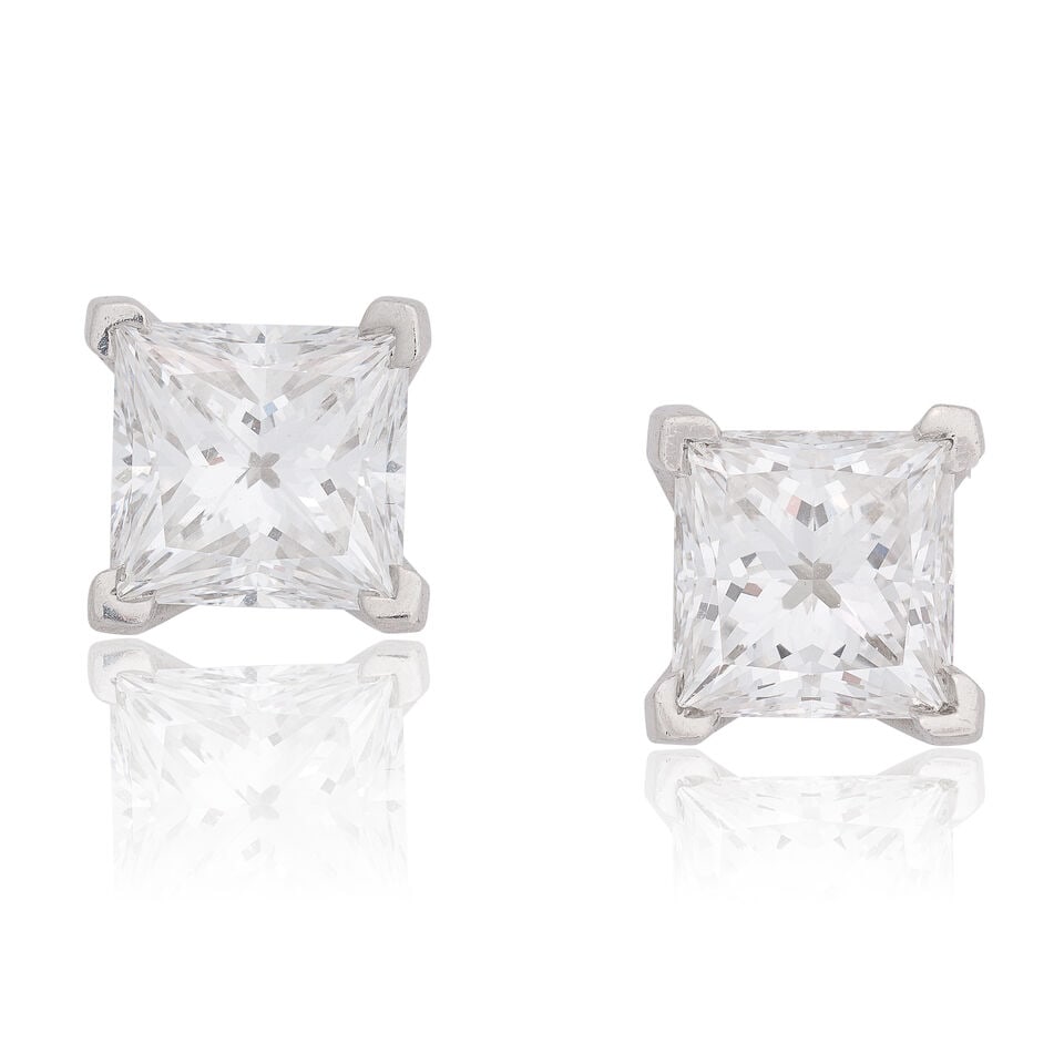 TIFFANY: DIAMOND EARSTUDS, 2008: TIFFANY: DIAMOND EARSTUDS, 2008 Princess-cut diamonds 1.40 carats total Platinum Signed T & Co., maker's mark T&Co, numbered 24591735, London hallmark Length 6.0cm Weight approx.