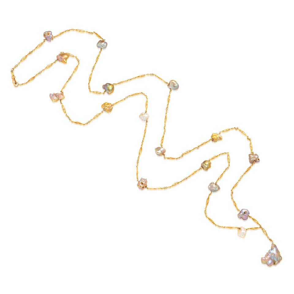 BAROQUE PEARL LONGCHAIN, LATE 19TH CENTURY: BAROQUE PEARL LONGCHAIN, LATE 19TH CENTURY Baroque pearls Length 140.0cm Weight approx. 66.5g Footnotes: OVERALL CONDITION Light surface wear to unhallmarked metal chain, stamped to clasp 15, testing