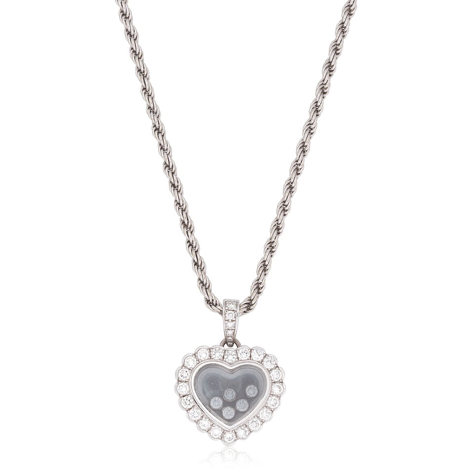 CHOPARD: 'HAPPY DIAMONDS' PENDANT/NECKLACE: CHOPARD: 'HAPPY DIAMONDS' PENDANT/NECKLACE Brilliant-cut diamonds approx. 1.05cts total 18 carat gold Signed Chopard, European convention mark Lengths: chain 40.0cm, pendant 2.5cm Total weight