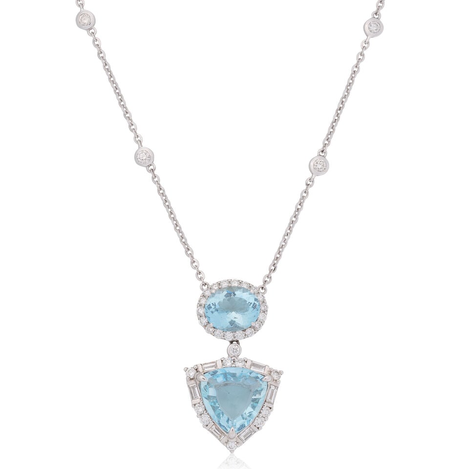 AQUAMARINE AND DIAMOND PENDANT: AQUAMARINE AND DIAMOND PENDANT Oval and triangular-cut aquamarine Brilliant and baguette-cut diamonds approx. 1.30cts total Length 44.5cm, pendant length 3.5cm Weight approx. 12.0g Footnotes: OVERALL