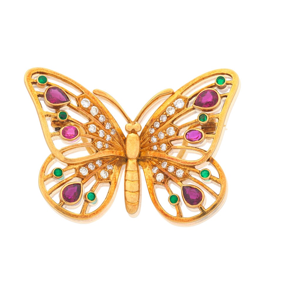 GEM-SET BUTTERFLY BROOCH: GEM-SET BUTTERFLY BROOCH Oval and pear-cut rubies Circular-cut emeralds Brilliant and single-cut diamonds approx. 0.35ct total 18 carat gold Maker's mark, London hallmark Width 4.0cm Weight