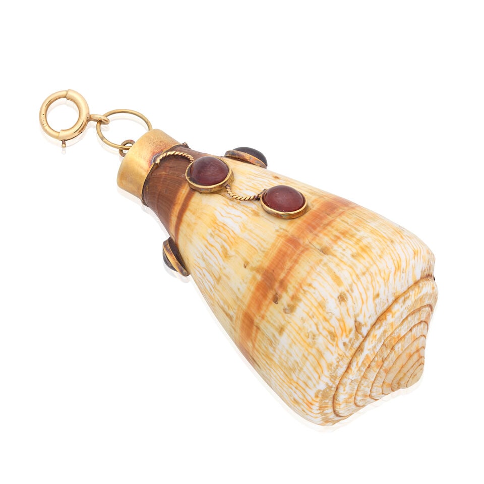 SHELL PENDANT: SHELL PENDANT Red paste cabochons Length 7.0cm Weight approx. 65.5g Footnotes: Jewellery from a Private American Collection This piece comes from a distinctive collection of jewellery formed by an