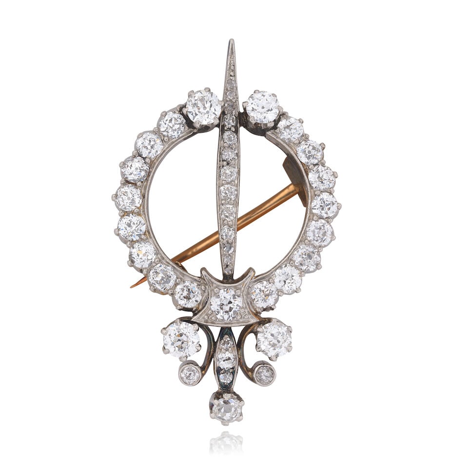 DIAMOND BROOCH: DIAMOND BROOCH Old brilliant-cut diamonds approx. 2.00cts total Length 3.5cm Weight approx. 6.5g Footnotes: OVERALL CONDITION Some surface wear commensurate with age to unhallmarked metal testing as