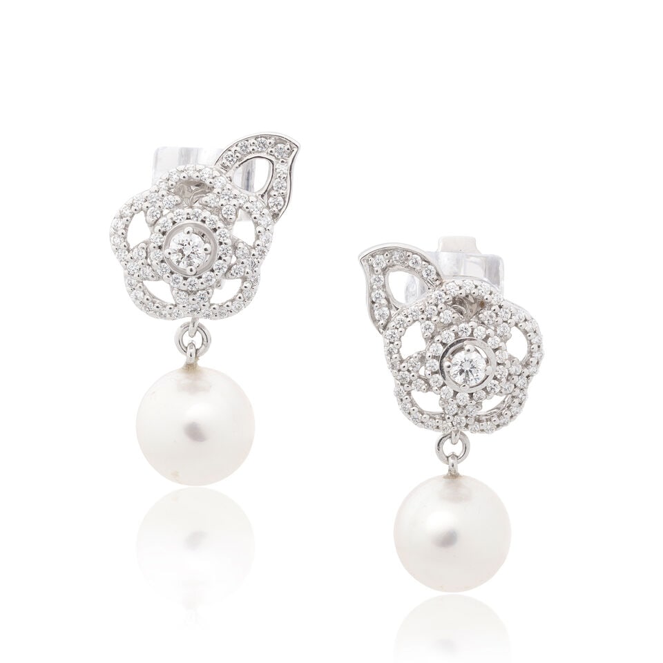 CHANEL: DIAMOND AND CULTURED PEARL 'FILS DE CAMELIA' EARRINGS: CHANEL: DIAMOND AND CULTURED PEARL 'FILS DE CAMELIA' EARRINGS Brilliant-cut diamonds approx. 0.70ct total Cultured pearls Signed Chanel, numbered A17906, maker's mark, London hallmark, European