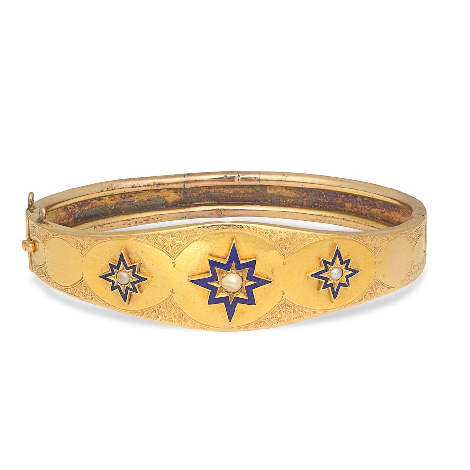 PEARL AND ENAMEL BANGLE: PEARL AND ENAMEL BANGLE Pearl and seed pearls Inner circumference 17.0cm Weight approx. 16.5g Footnotes: OVERALL CONDITION Some surface wear commensurate with age to unhallmarked metal testing as