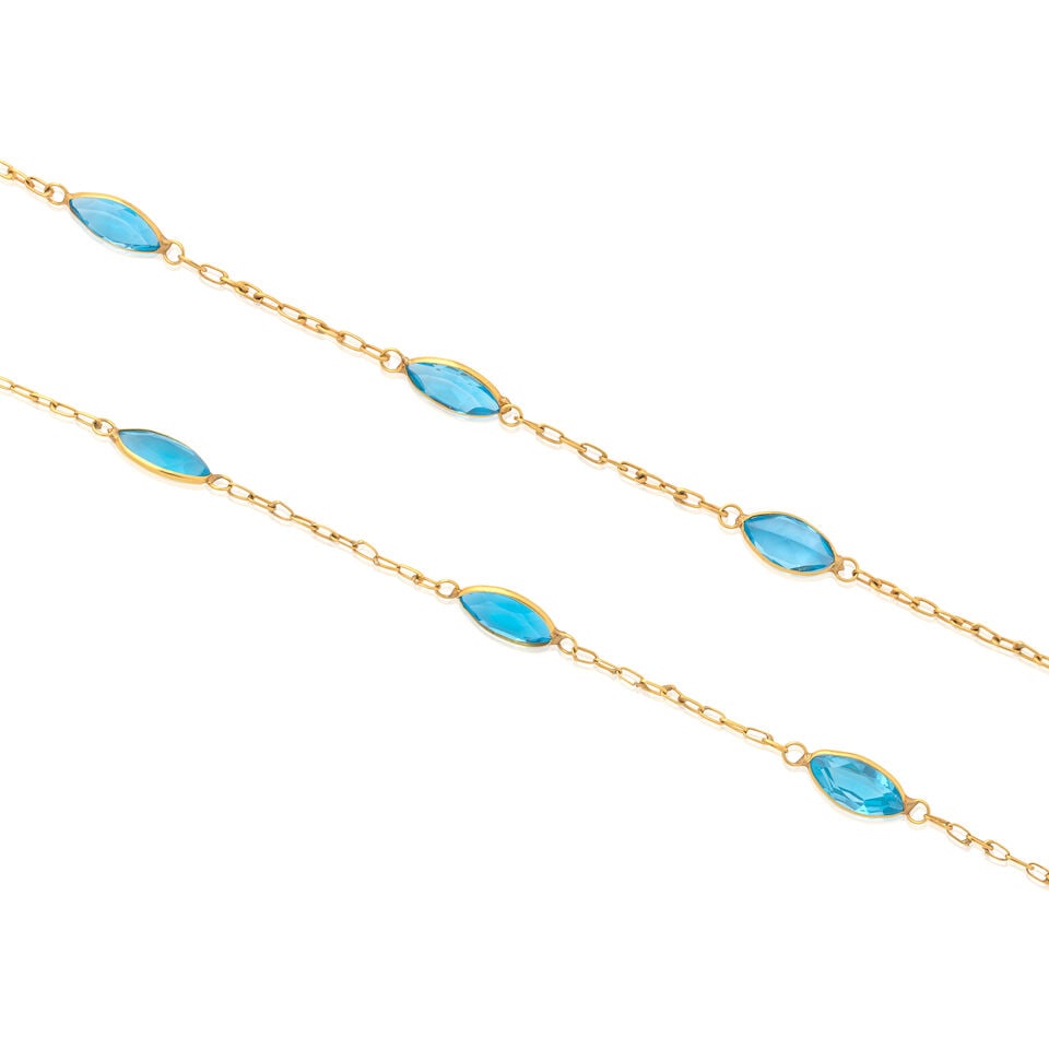 TOPAZ NECKLACE: TOPAZ NECKLACE Marquise-cut blue topaz Length 93.0cm Weight approx. 10.5g Footnotes: OVERALL CONDITION Light surface wear to unhallmarked metal testing as 7kt gold. Figure of eight clasp secure.