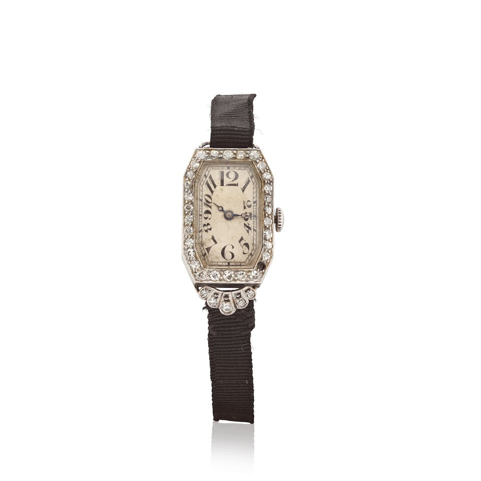DIAMOND-SET COCKTAIL WATCH: DIAMOND-SET COCKTAIL WATCH Old single-cut diamonds approx. 0.60ct total Length of case 2.4cm Weight approx. 13.5g Footnotes: OVERALL CONDITION Some surface wear to unhallmarked metal testing as