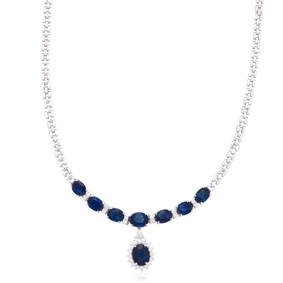 SAPPHIRE AND DIAMOND NECKLACE: SAPPHIRE AND DIAMOND NECKLACE Oval-cut sapphires Brilliant-cut diamonds approx. 0.80ct total Length 59.0cm Weight approx. 34.5g Footnotes: OVERALL CONDITION Light surface wear to unhallmarked metal