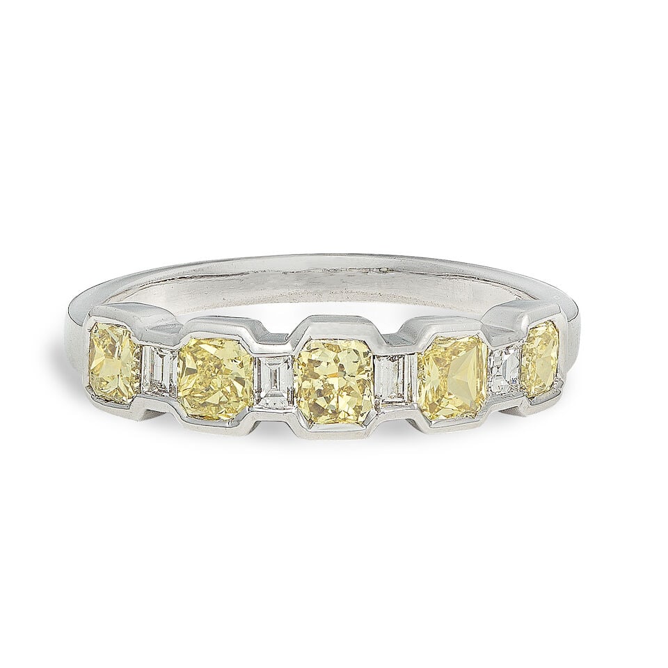 COLOURED DIAMOND RING: COLOURED DIAMOND RING Fancy-cut coloured diamonds of yellow tint approx. 0.70ct total 18 carat gold UK hallmark Ring size approx. O Weight approx. 3.5g Footnotes: OVERALL CONDITION Light surface