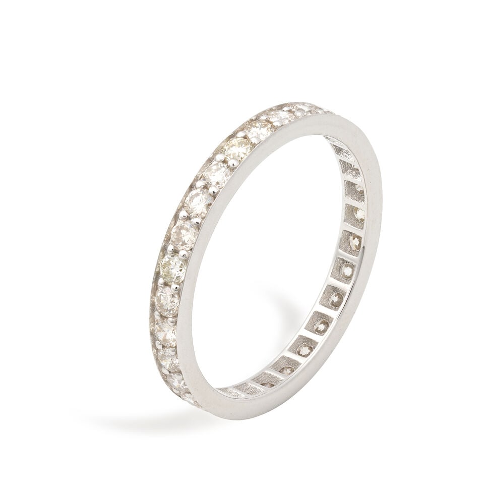 DIAMOND ETERNITY RING: DIAMOND ETERNITY RING Brilliant-cut diamonds approx. 0.80ct total Ring size approx. O Weight approx. 2.5g Footnotes: OVERALL CONDITION Negligible surface wear to unhallmarked metal testing as