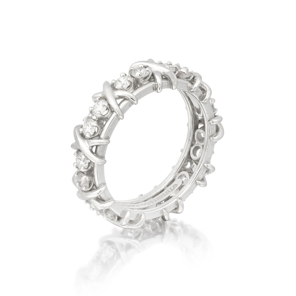 SCHLUMBERGER FOR TIFFANY: DIAMOND-SET ETERNITY RING: SCHLUMBERGER FOR TIFFANY: DIAMOND-SET ETERNITY RING Brilliant-cut diamonds approx. 1.80cts total Signed Tiffany & Co., Schlumberger Studios Ring size approx. T Weight approx. 13.0g Footnotes: OVERALL