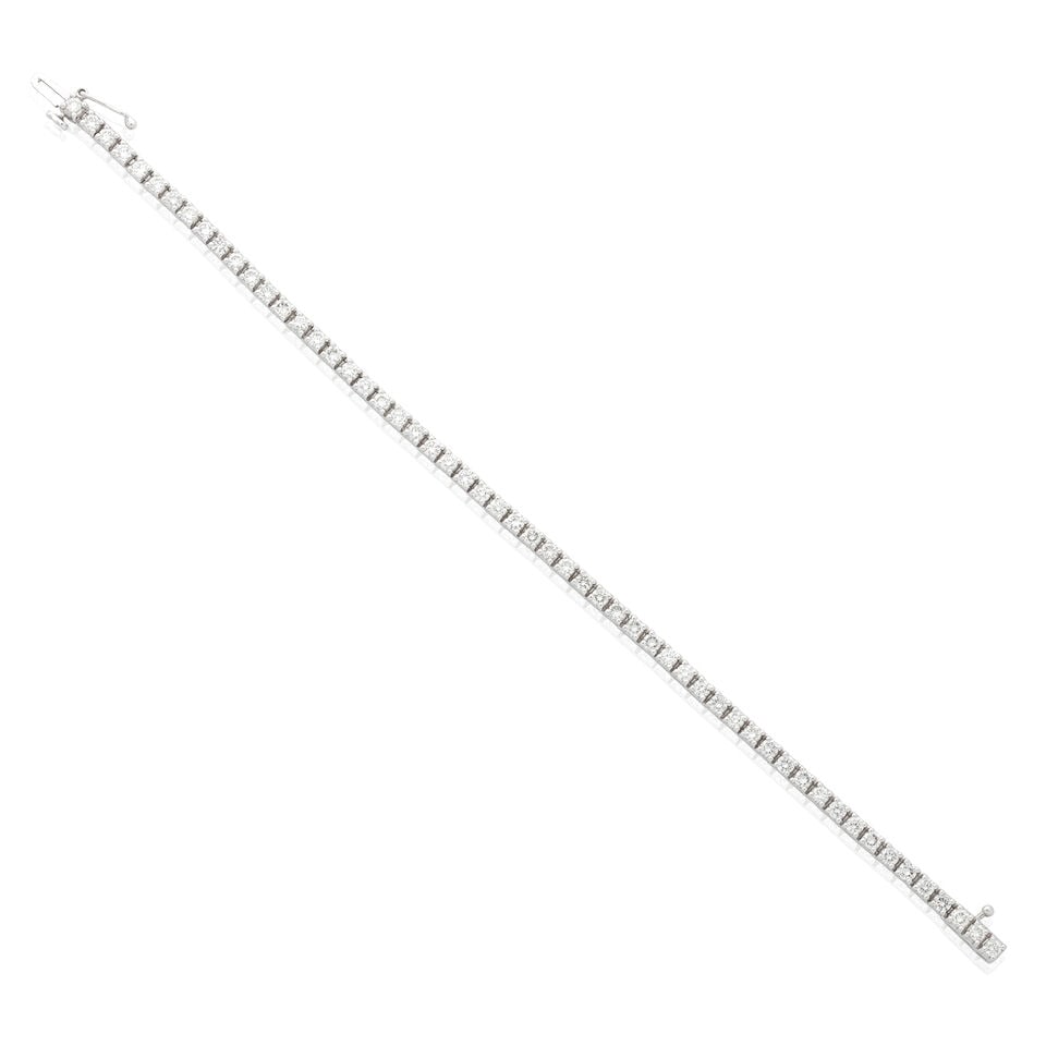 DIAMOND LINE BRACELET, 2001: DIAMOND LINE BRACELET, 2001 Brilliant-cut diamonds approx. 3.85cts total 18 carat gold London hallmark Length 18.5cm Weight approx. 13.5g Footnotes: OVERALL CONDITION Light surface wear to 18 carat