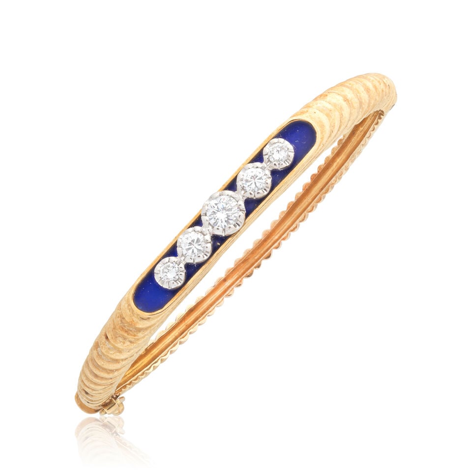 DIAMOND AND ENAMEL BANGLE: DIAMOND AND ENAMEL BANGLE Brilliant-cut diamonds approx. 0.65ct total Inner circumference approx. 15.0cm Weight approx. 19.5g Footnotes: OVERALL CONDITION Light surface wear to unhallmarked metal