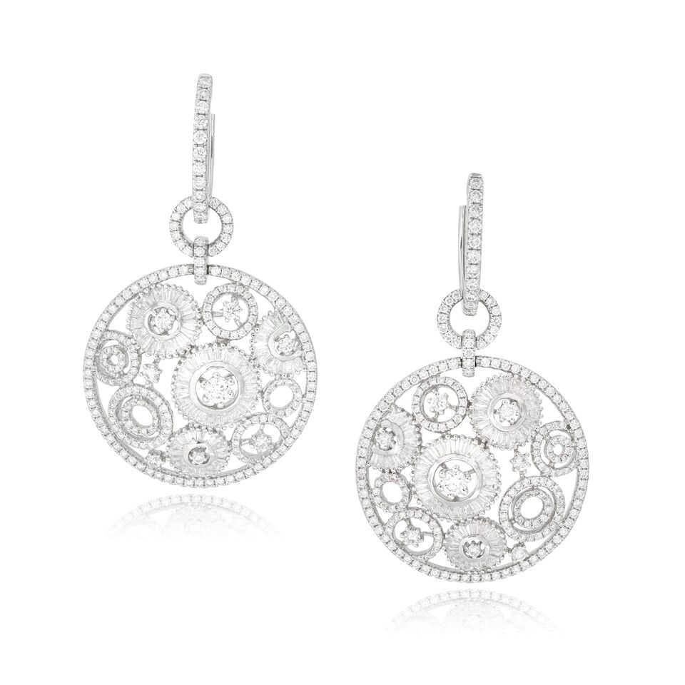 DIAMOND PENDENT EARRINGS: DIAMOND PENDENT EARRINGS Brilliant and tapered baguette-cut diamonds approx. 3.95cts total Length 4.5cm Weight approx. 15.0g Footnotes: WGI: 3.95 carats of round brilliant and tapered baguette-cut