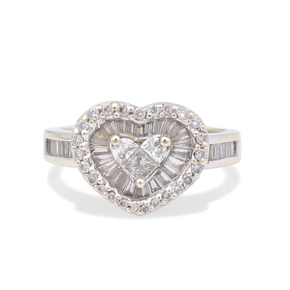 DIAMOND-SET HEART RING: DIAMOND-SET HEART RING Demi-moon, princess, tapered baguette, baguette and brilliant-cut diamonds approx. 1.05cts total 18 carat gold London hallmark, Convention mark Ring size approx. M Weight