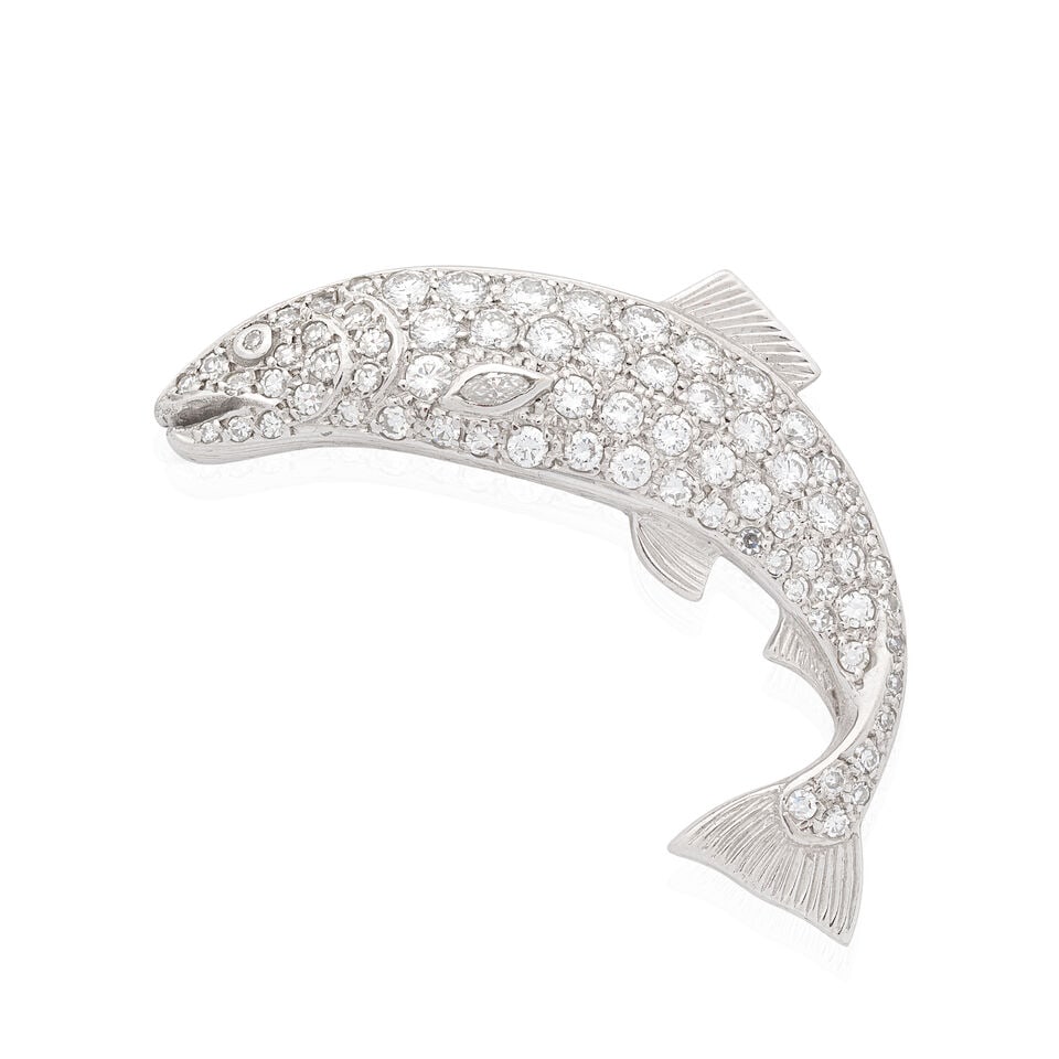 DIAMOND-SET FISH BROOCH: DIAMOND-SET FISH BROOCH Brilliant, single and marquise-cut diamonds approx. 1.40cts total Length 4.1cm Weight approx. 8.0g Footnotes: OVERALL CONDITION Light surface wear to unhallmarked metal