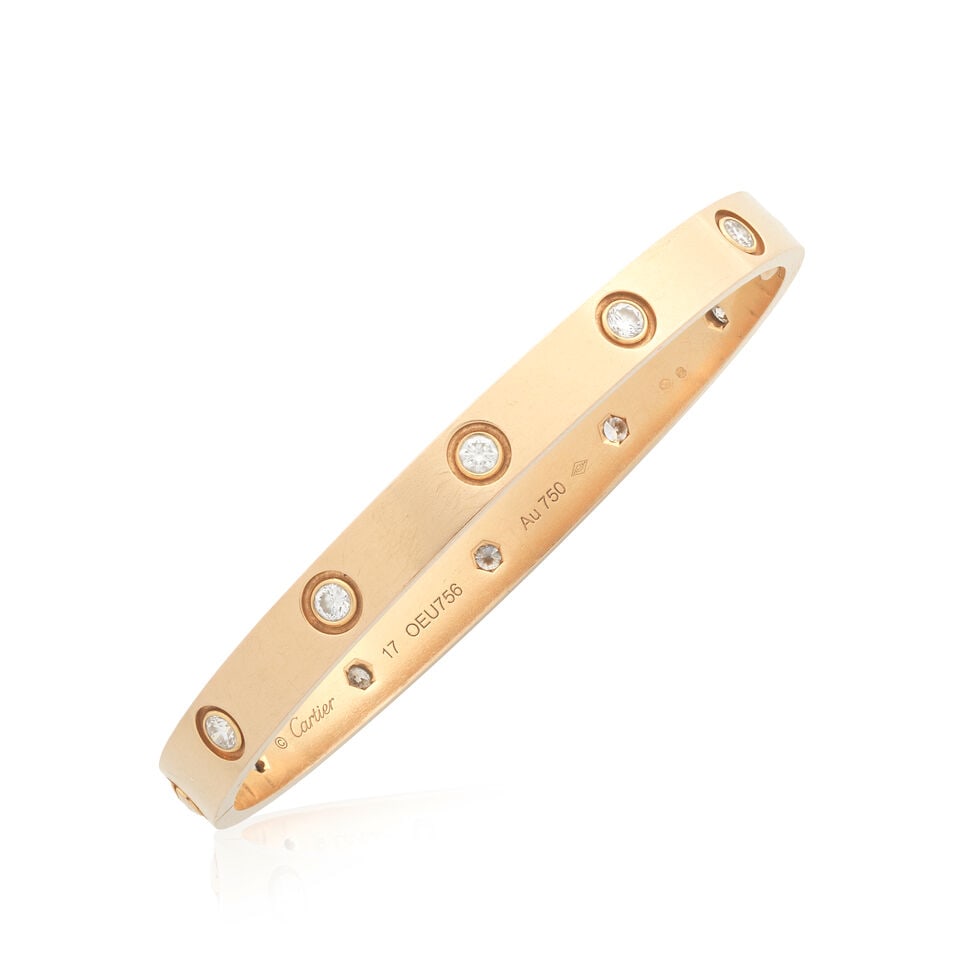 CARTIER: DIAMOND-SET 'LOVE' BANGLE: CARTIER: DIAMOND-SET 'LOVE' BANGLE Brilliant-cut diamonds approx. 0.70ct total 18 carat rose gold Signed Cartier, numbered OEU756, Convention mark, Swiss assay mark Inner circumference approx. 16.0cm 