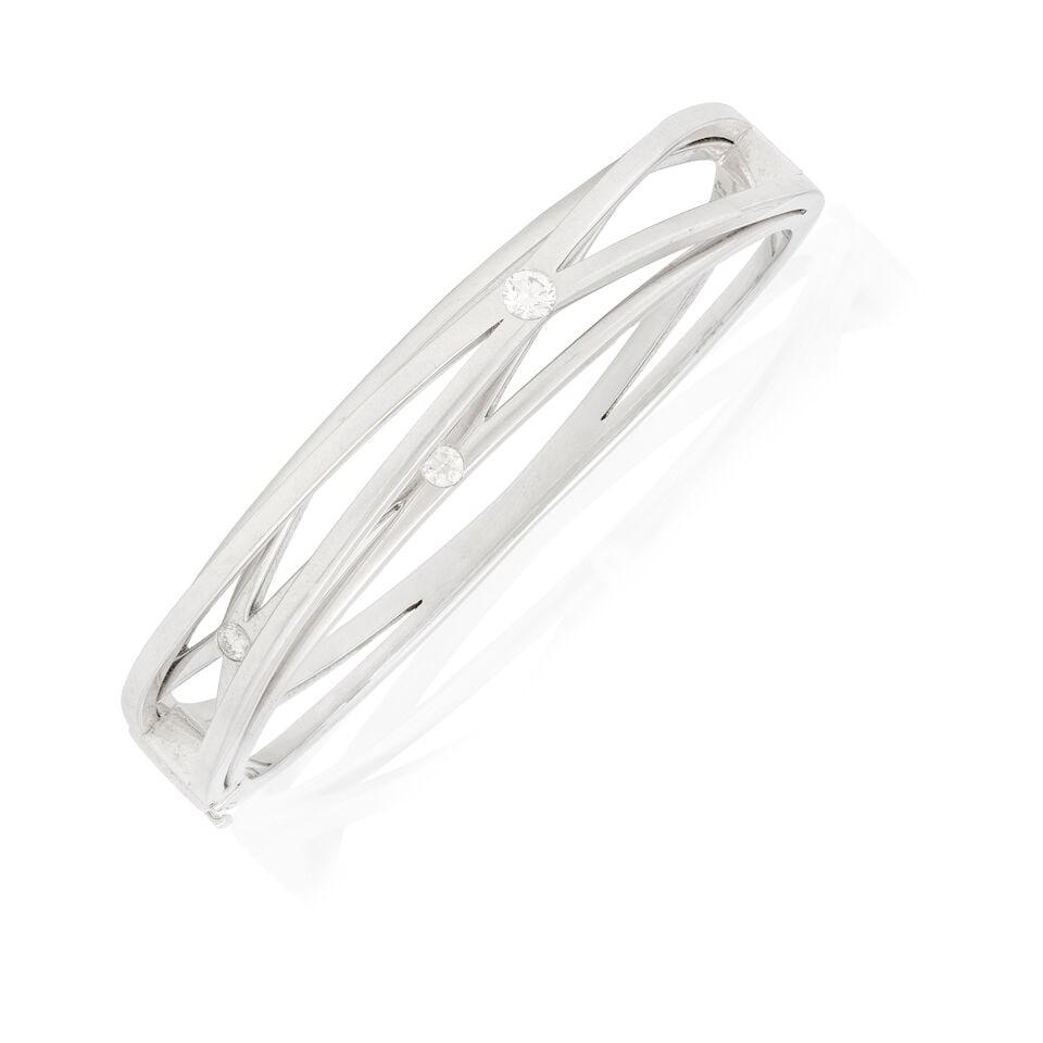 BOODLES: DIAMOND-SET 'LABYRINTH' BANGLE: BOODLES: DIAMOND-SET 'LABYRINTH' BANGLE Brilliant-cut diamonds approx. 0.40ct total Signed Boodles, numbered Inner circumference approx. 16.5cm Weight approx. 41.0g Footnotes: OVERALL CONDITION Light