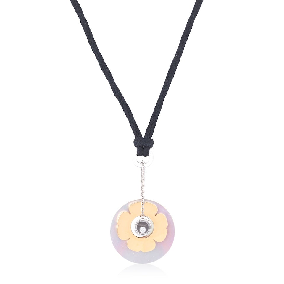 CHOPARD: DIAMOND-SET 'HAPPY DIAMONDS CLOVER' NECKLACE: CHOPARD: DIAMOND-SET 'HAPPY DIAMONDS CLOVER' NECKLACE Brilliant-cut diamond Mother-of-pearl slices Signed Chopard, numbered 79/6472/401-20 Pendant length 4.0cm (including bale), cord length approx. 40