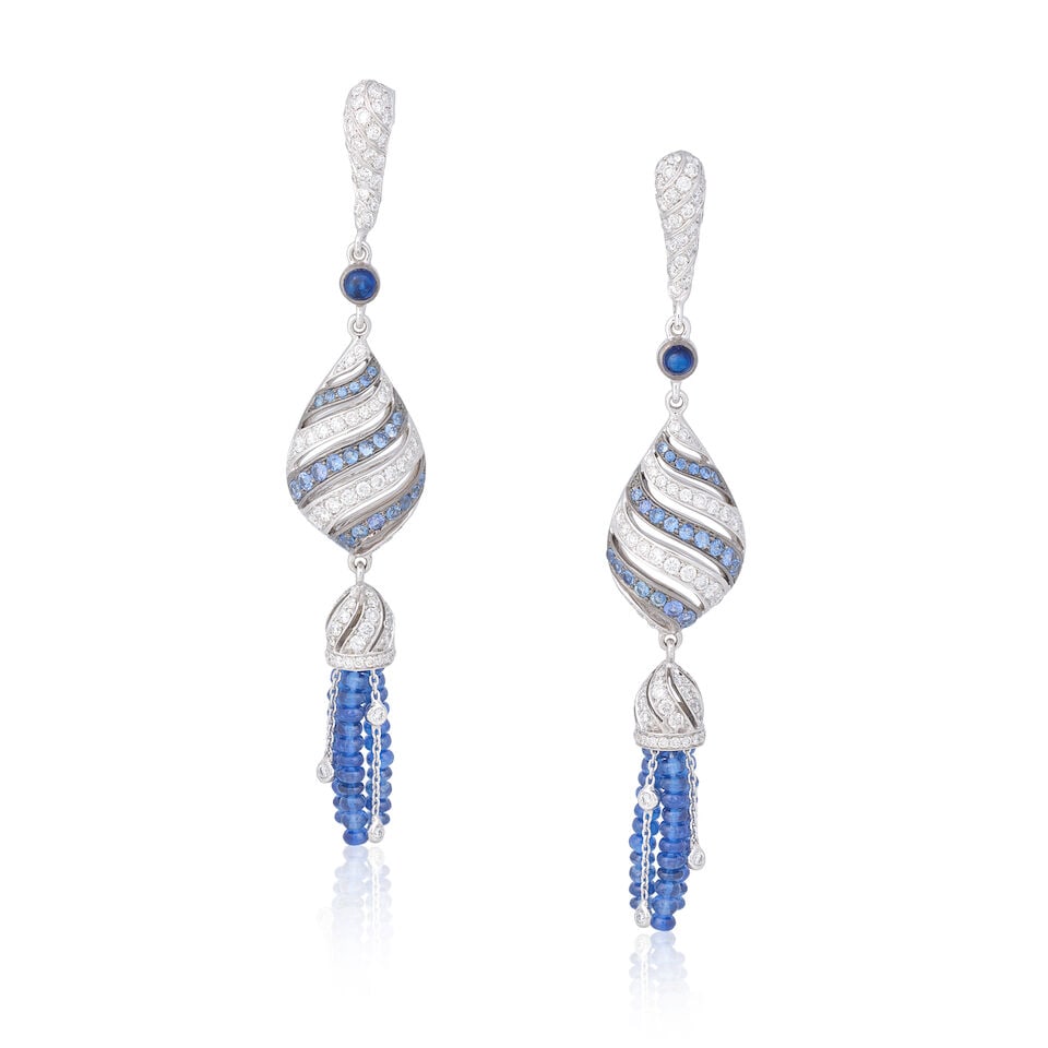 GILAN: SAPPHIRE AND DIAMOND PENDENT EARRINGS: GILAN: SAPPHIRE AND DIAMOND PENDENT EARRINGS Circular-cut, cabochon and beads of sapphire Brilliant-cut diamonds approx. 1.55cts total Length approx. 7.2cm Weight approx. 7.5g Footnotes: OVERALL CONDI