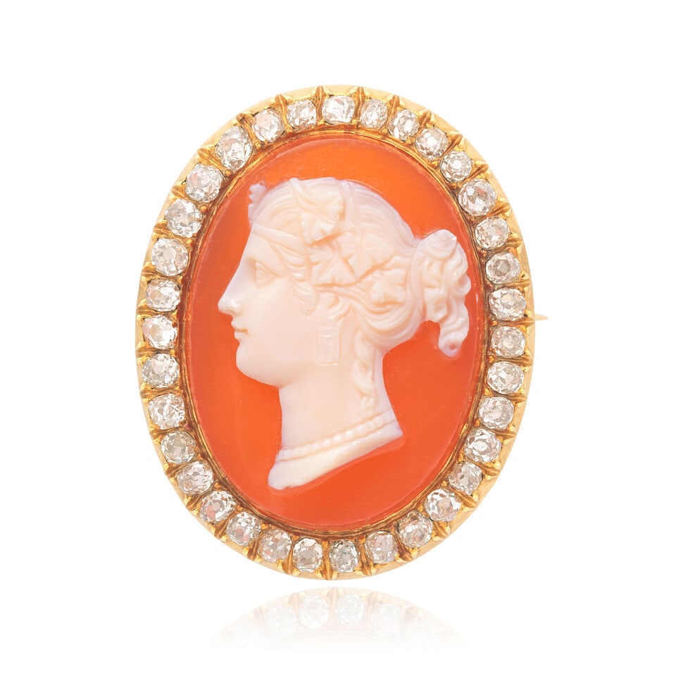DIAMOND-SET CAMEO BROOCH: DIAMOND-SET CAMEO BROOCH Old brilliant and single-cut diamonds approx. 1.30cts total Bi-coloured resin cameo Length 3.0cm Weight approx. 11.0g Footnotes: OVERALL CONDITION Some surface wear to