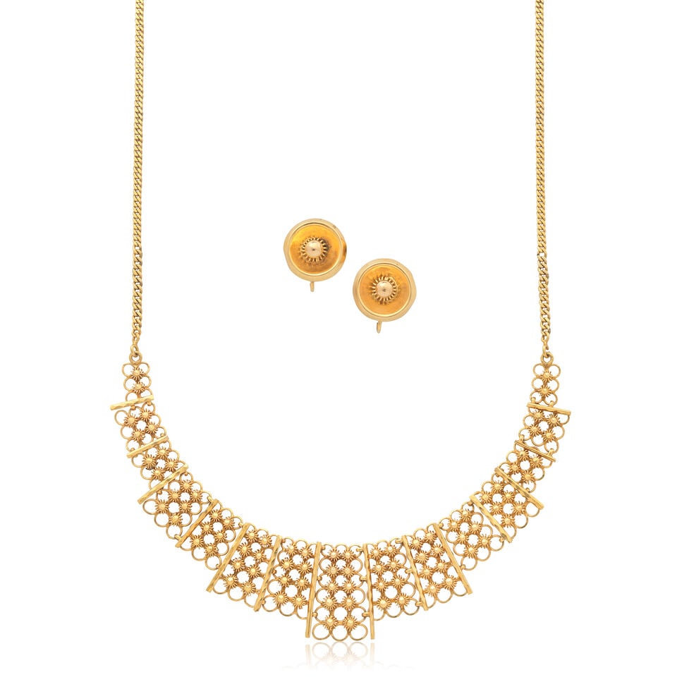 NECKLACE AND EARRINGS: NECKLACE AND EARRINGS Of filigree design Necklace length 45.0cm, earring plaque length 15.5cm Weight approx. 29.0g Footnotes: OVERALL CONDITION Some surface wear to unhallmarked metal, earrings and