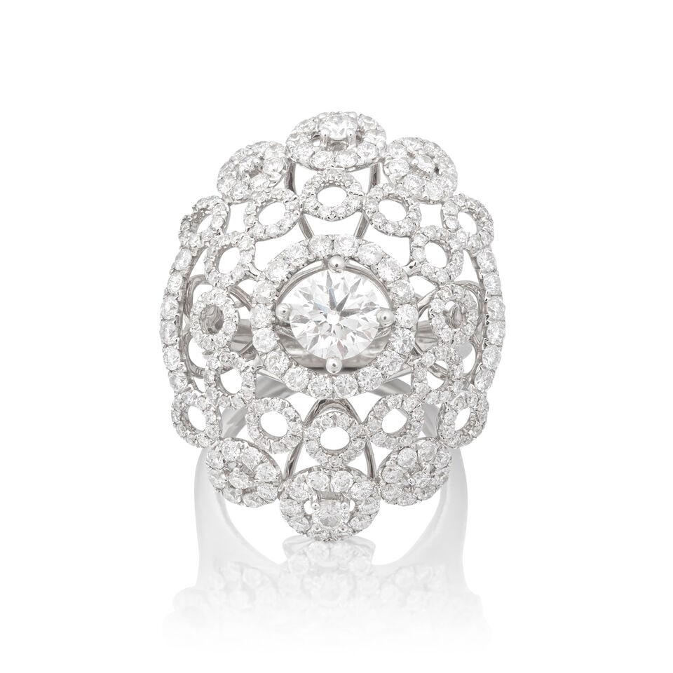 DIAMOND DRESS RING: DIAMOND DRESS RING Brilliant-cut diamond approx. 0.90ct Remaining diamonds approx. 1.05cts total Ring size approx. J Weight approx. 8.5g Footnotes: WGI: 0.90 carat diamond, J colour, VS1 clarity.