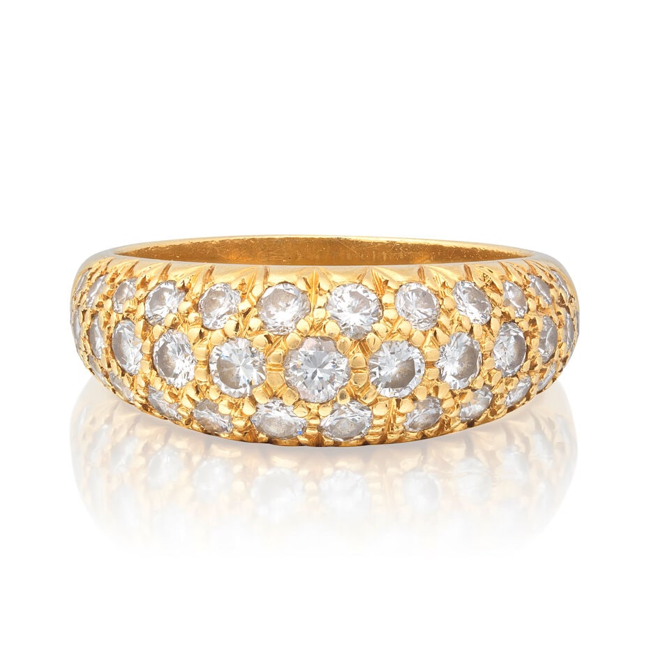 DIAMOND BOMBÉ RING: DIAMOND BOMBÉ RING Brilliant-cut diamonds approx. 0.70ct total Ring size approx. N Weight approx. 6.0g Footnotes: OVERALL CONDITION Light surface wear to unhallmarked metal stamped to inner hoop