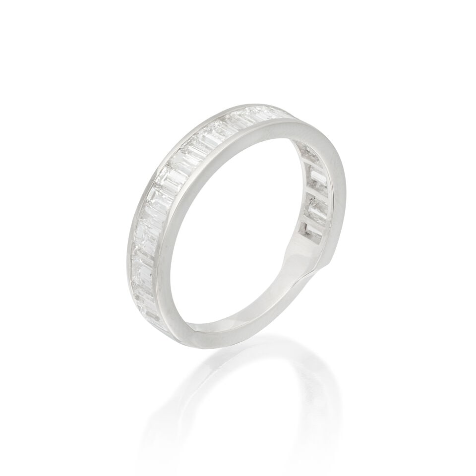 DIAMOND ETERNITY RING: DIAMOND ETERNITY RING Step-cut diamonds 1.27 carats total Ring size approx. N Weight approx. 3.5g Footnotes: OVERALL CONDITION Negligible surface wear to unhallmarked metal testing as platinum.