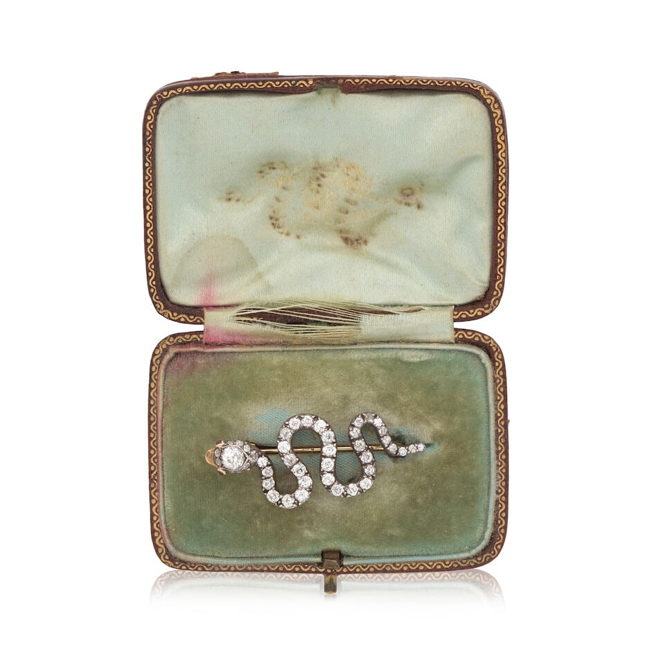 DIAMOND AND RUBY SERPENT BROOCH, CIRCA 1850 - 2