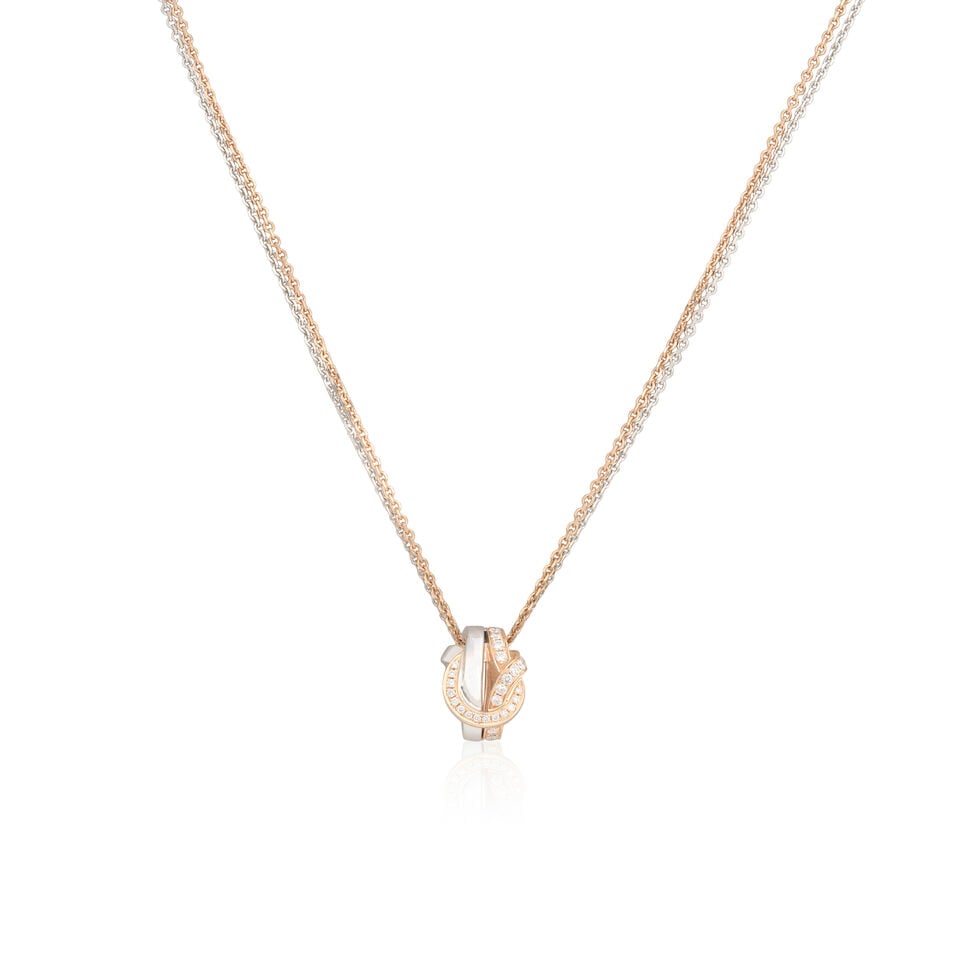 BOODLES: DIAMOND-SET 'KNOT' PENDANT/NECKLACE: BOODLES: DIAMOND-SET 'KNOT' PENDANT/NECKLACE Brilliant-cut diamonds approx. 0.30ct total Chain signed Boodles, numbered 0735170855, maker's mark B&D, London hallmark Pendant length 1.5cm, chain
