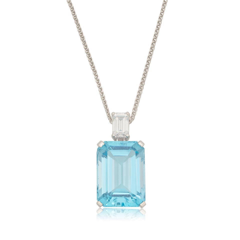 TOPAZ AND DIAMOND-SET PENDANT/NECKLACE: TOPAZ AND DIAMOND-SET PENDANT/NECKLACE Octagonal step-cut topaz Brilliant-cut diamonds approx. 0.80ct total Pendant length 2.0cm, chain length 50.0cm Weight approx. 6.0g Footnotes: OVERALL