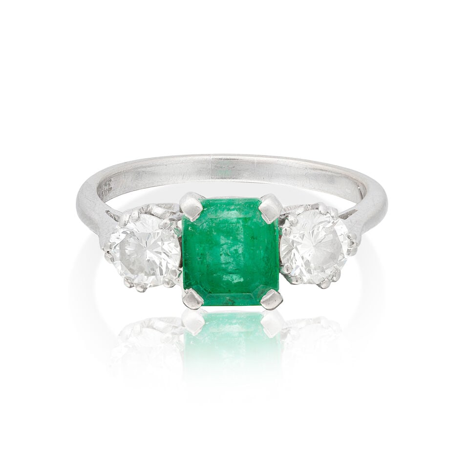 EMERALD AND DIAMOND RING: EMERALD AND DIAMOND RING Octagonal step-cut emerald Brilliant-cut diamonds approx. 1.00cts total Ring size approx. P Weight approx. 4.0g Footnotes: OVERALL CONDITION Light surface wear to
