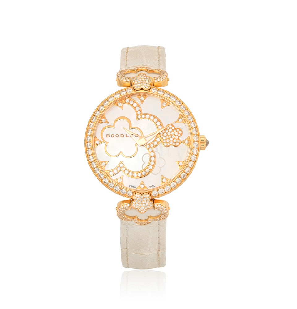 BOODLES: DIAMOND AND MOTHER-OF-PEARL SET 'BLOSSOM' WATCH: BOODLES: DIAMOND AND MOTHER-OF-PEARL SET 'BLOSSOM' WATCH Brilliant-cut diamonds approx. 3.80cts total Mother-of-pearl 18 carat gold Signed Boodles, numbered 2525N0021, Convention mark, Swiss assay mar