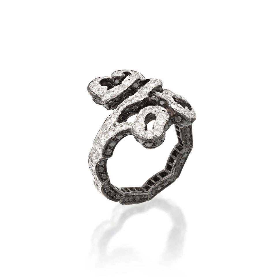 MICHELLE ONG FOR CARNET: DIAMOND-SET 'CLOUD' RING: MICHELLE ONG FOR CARNET: DIAMOND-SET 'CLOUD' RING Brilliant-cut diamonds and circular-cut treated black diamonds approx. 1.20cts total Signed Carnet Ring size approx. K Weight approx. 6.0g Maker's
