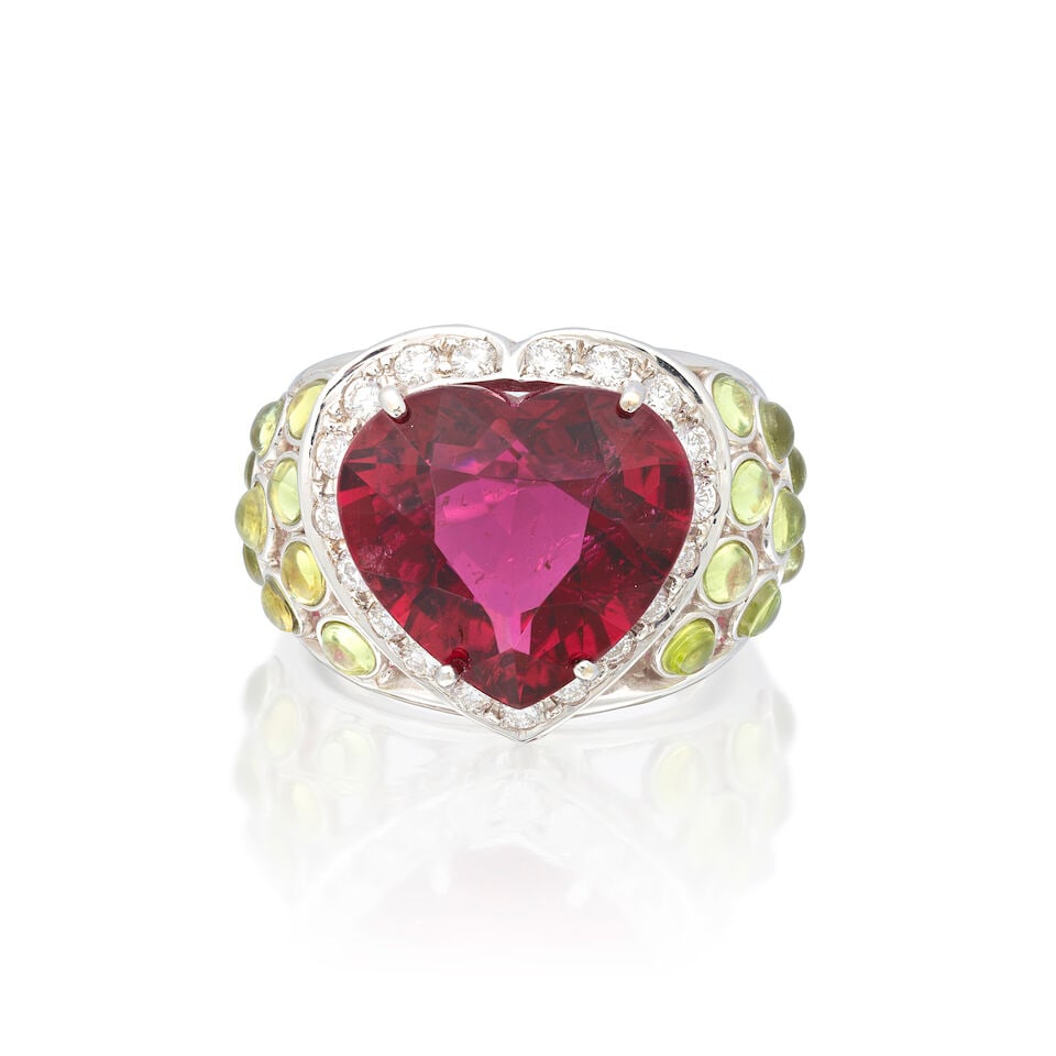 TOURMALINE, PERIDOT AND DIAMOND RING: TOURMALINE, PERIDOT AND DIAMOND RING Heart-shaped tourmaline Peridot cabochons Brilliant-cut diamonds approx. 0.55ct total Ring size approx. J½ Weight approx. 13.0g Footnotes: OVERALL CONDITION V