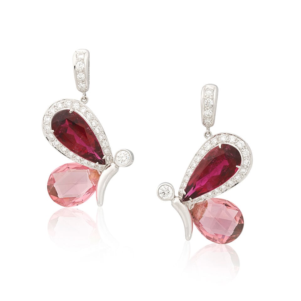 TOURMALINE AND DIAMOND-SET BUTTERFLY EARRINGS: TOURMALINE AND DIAMOND-SET BUTTERFLY EARRINGS Pear-cut red tourmaline Faceted pear-cut pink tourmaline Brilliant-cut diamonds approx. 1.15cts total Length 3.0cm Weight approx. 7.5g Footnotes: OVERALL