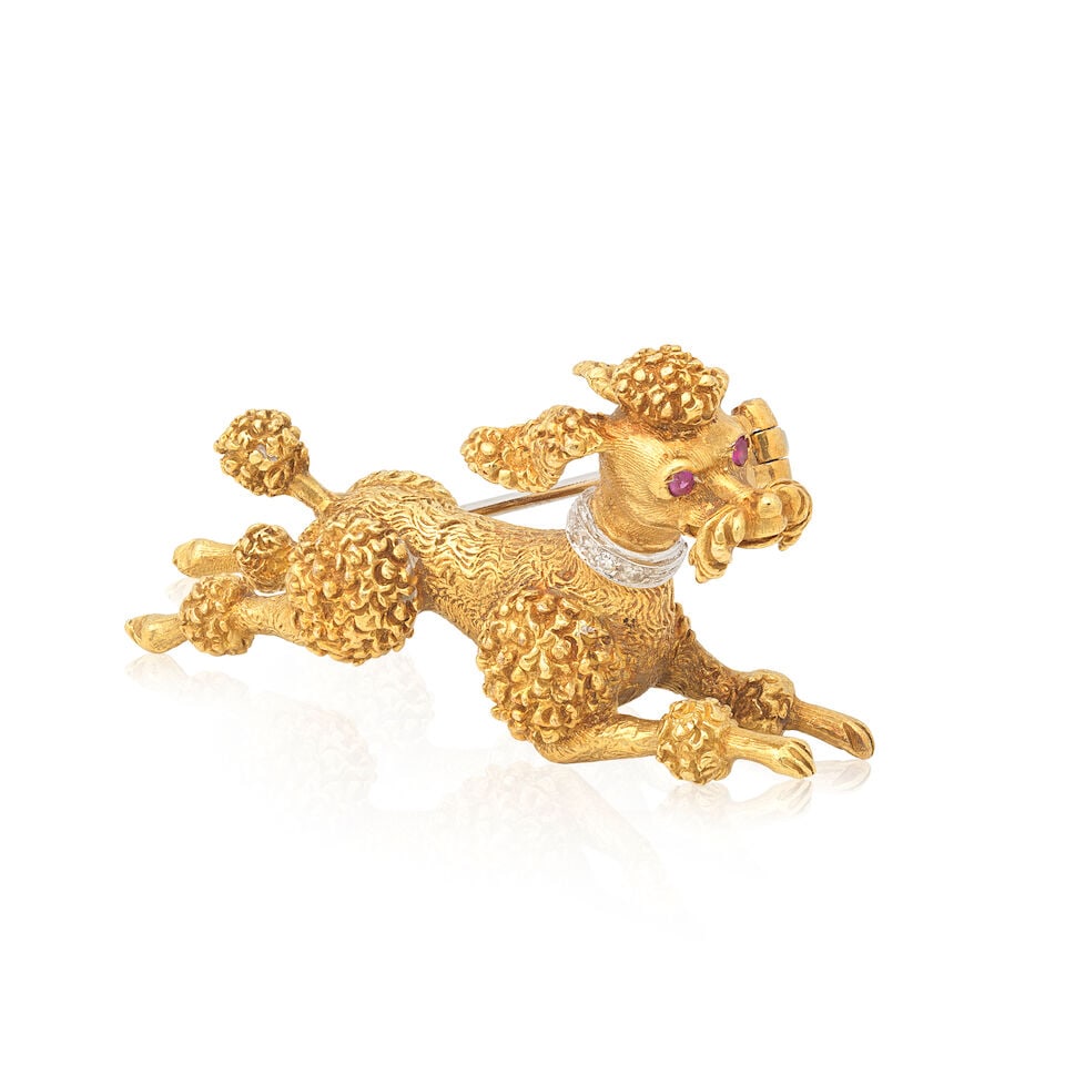 GEM-SET POODLE BROOCH: GEM-SET POODLE BROOCH Circular-cut rubies Single-cut diamonds Length 4.7cm Weight approx. 12.5g Footnotes: OVERALL CONDITION Very light surface wear to unhallmarked metal with two illegible, poorly