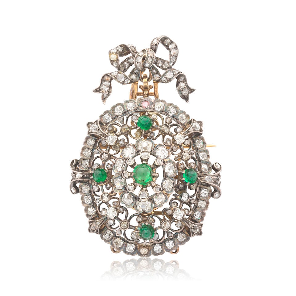 EMERALD AND DIAMOND BROOCH, CIRCA 1880: EMERALD AND DIAMOND BROOCH, CIRCA 1880 Emerald sugarloaf cabochons Old single, brilliant and rose-cut diamonds very approx. 1.15cts total Mounted in gold French import mark Length 4.7cm Weight