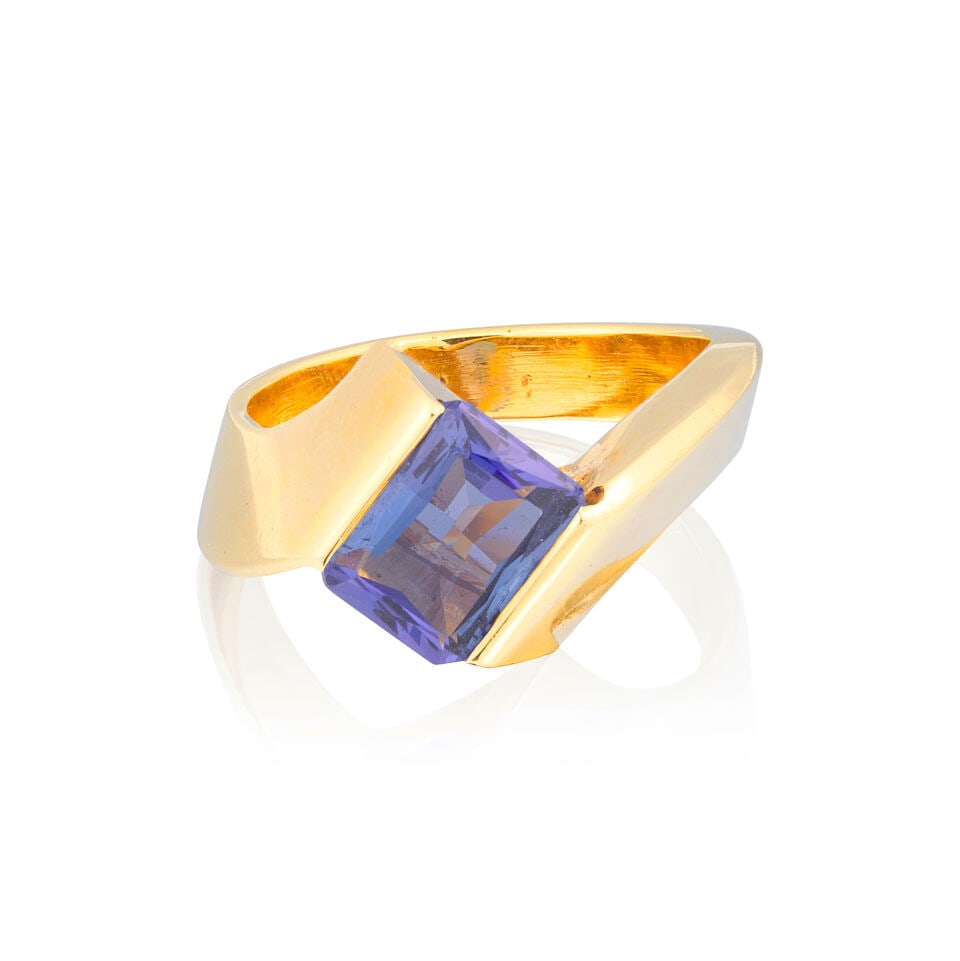 TANZANITE RING: TANZANITE RING Octagonal step-cut tanzanite Ring size approx. L½ Weight approx. 8.5g Footnotes: OVERALL CONDITION Light surface wear to unhallmarked metal, testing as 17kt gold, stamped to inner