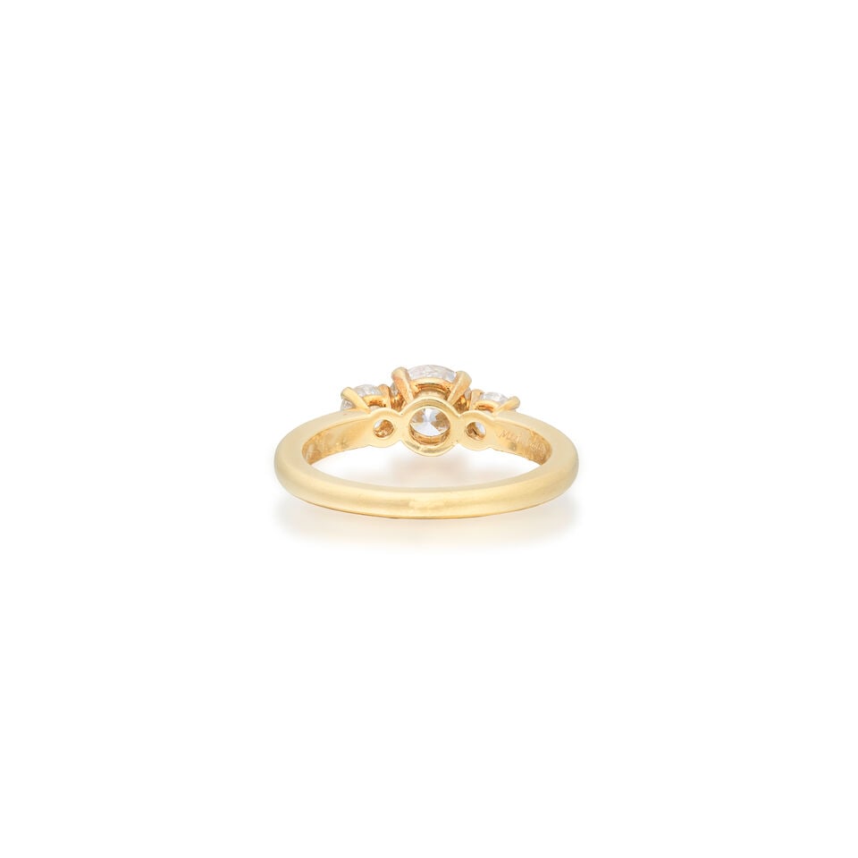 MOUNTED BY CARTIER: DIAMOND THREE-STONE RING, 1994 - 2