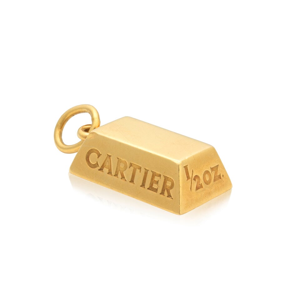 CARTIER: INGOT PENDANT: CARTIER: INGOT PENDANT Signed Cartier, numbered 807218 Length 2.5cm Weight approx. 15.0g Footnotes: OVERALL CONDITION Some surface wear commensurate with use, small nick, the unhallmarked yellow