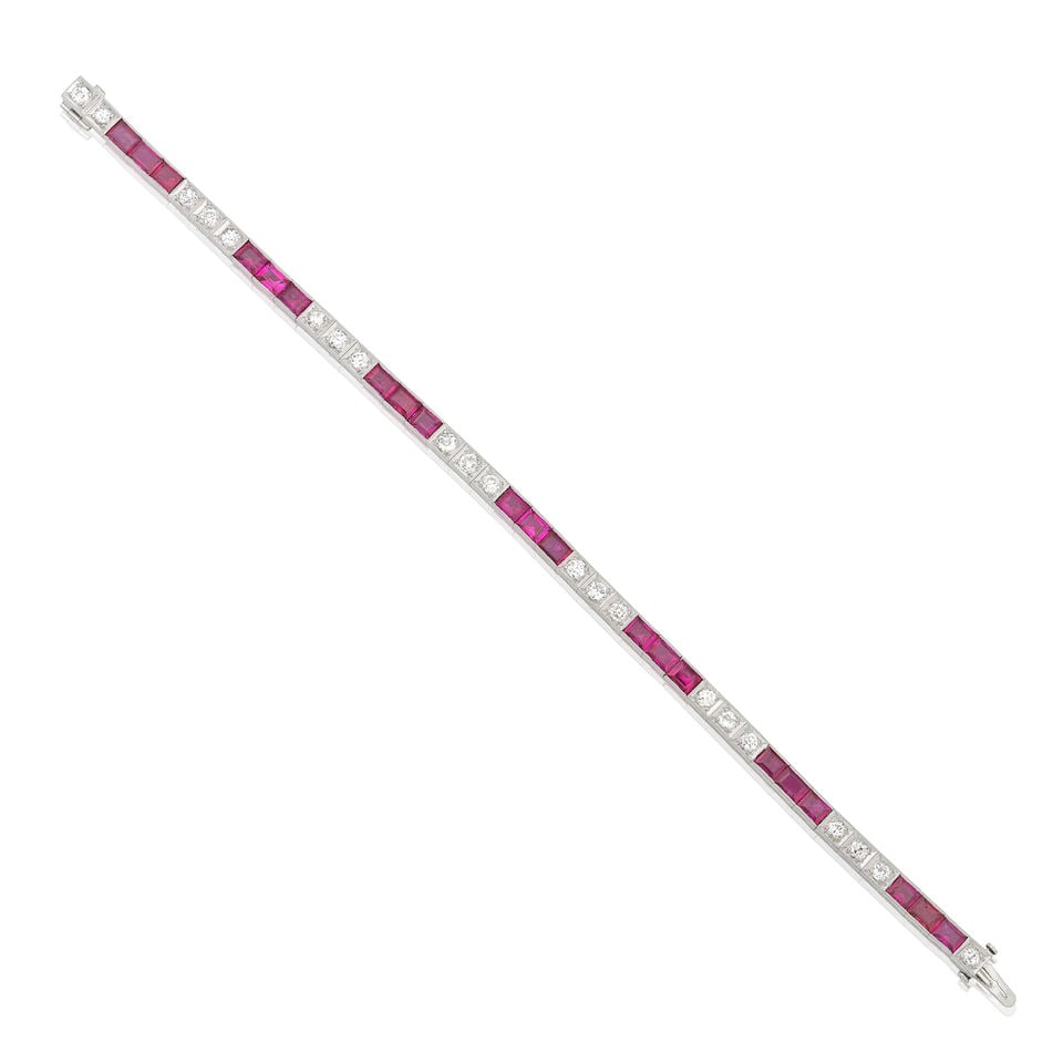 RUBY AND DIAMOND LINE BRACELET: RUBY AND DIAMOND LINE BRACELET Old brilliant-cut diamonds approx. 0.55ct total Step-cut rubies (untested) Length 18.0cm Weight approx. 19.5g Footnotes: OVERALL CONDITION Very light surface wear to
