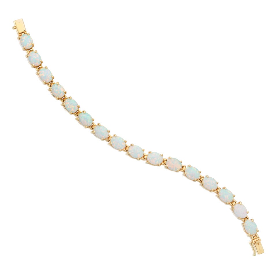 OPAL BRACELET: OPAL BRACELET Opal cabochons Length 18.0cm Weight approx. 19.0g Footnotes: OVERALL CONDITION Very light surface wear to unhallmarked yellow metal stamped to clasp with 14K. Clasp secure. OPALS Each