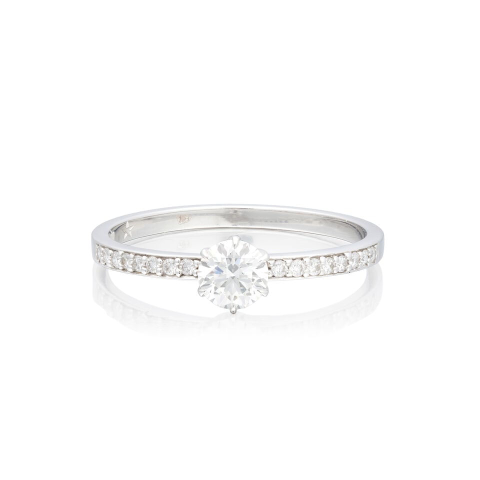 H STERN: SINGLE STONE DIAMOND RING: H STERN: SINGLE STONE DIAMOND RING Brilliant-cut diamond 0.40 carat Brilliant-cut diamonds approx. 0.15ct total Maker's mark HS Ring size approx. P½ Weight approx. 2.0g Footnotes: GIA: F colour,
