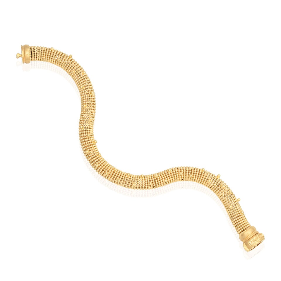 UNOAERRE: MESH BRACELET: UNOAERRE: MESH BRACELET Of tubogas design 18 carat gold Convention mark, London hallmark Signed Unoaerre Length 21.5cm Weight approx. 35.0g Footnotes: OVERALL CONDITION Light surface wear to 18 carat