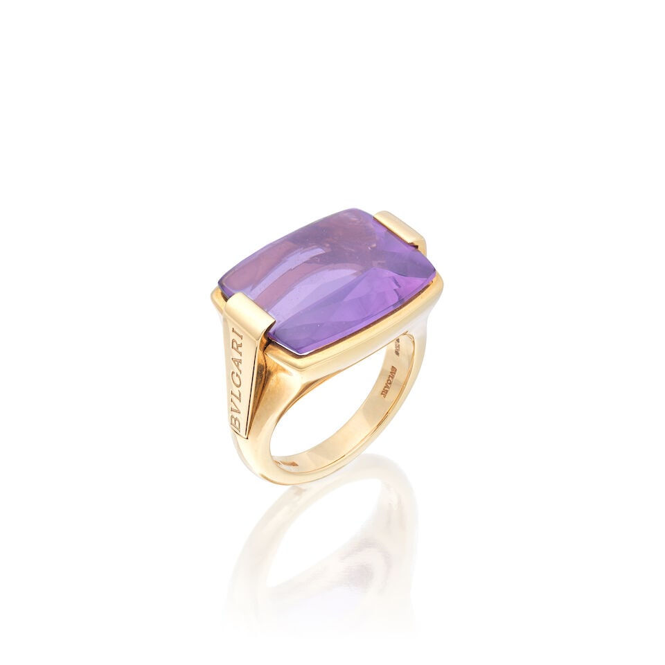 BULGARI: AMETHYST 'METROPOLIS' RING: BULGARI: AMETHYST 'METROPOLIS' RING Fancy-cut amethyst 18 carat gold Signed Bulgari, maker's mark SB, Convention mark, UK hallmark Ring size approx. J Weight approx. 11.5g Maker's