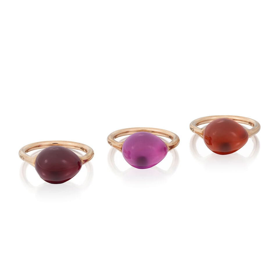 POMELLATO: THREE GEM-SET 'ROUGE PASSION' RINGS: POMELLATO: THREE GEM-SET 'ROUGE PASSION' RINGS Synthetic sapphire cabochons 9 carat gold Signed, maker's mark PO, UK hallmarks Ring size approx. I½ (hoop off round) Weight approx.